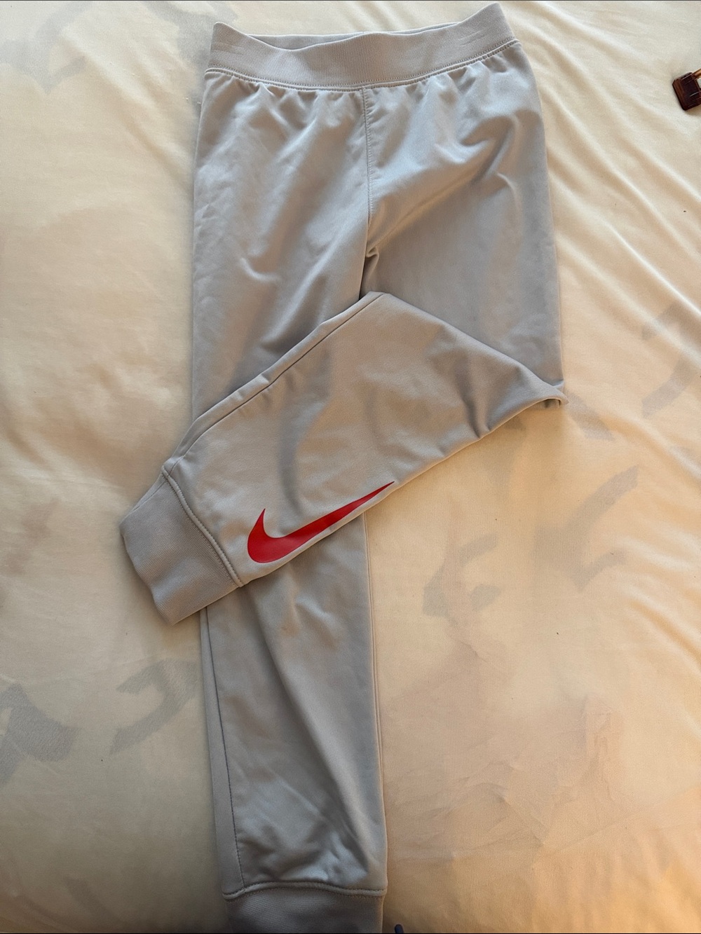 Nike Kids Light Gray Sweat Joggers with Red Swoosh